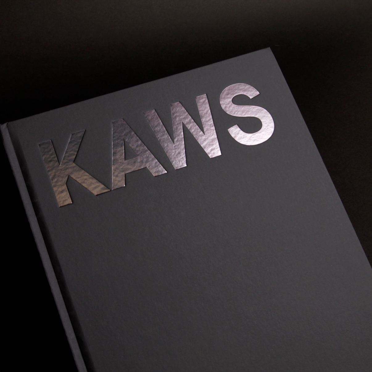 KAWS: Blackout exhibition catalogue - Fonts In Use